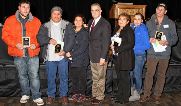 Juan Garcia, national administrator of the USDA Farm Service Agency, is pictured (center) with Inspiration Award winners (from right) Alfredo Mendoza and his daughter Evelia Mendoza, Victoria Lopez, Maria and Pedro Rodriguez, and Francisco Rios. (Courtesy Center for Latino Farmers)
