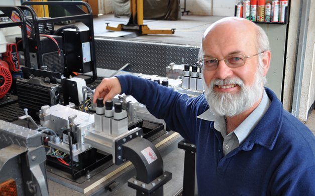 Engineer Graham Brodie developed the microwave weed-killing machine.