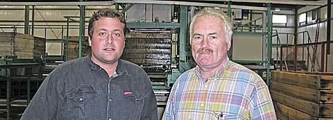 Austin Fowler, left, and his father, Bob Fowler, are part of the family team that runs Fowler Farms, said to be one of the world's largest super spindle growers. Photo by Melissa Hansen.
