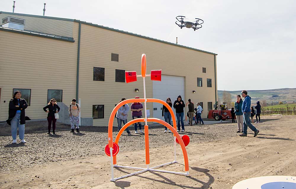 The AgAID Institute is primarily a research effort, but part of its mission is to recruit the next generation of tech-savvy agricultural workers. Exposing them to drone obstacle courses is just one method. (Ross Courtney/Good Fruit Grower)