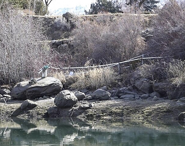 An irrigation pump is exposed south of the Rock Island Dam after water was drawn down from the Wanapum Dam at the end of February, 2014. (Courtesy Chelan Public Utilities District)