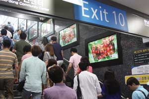 Video and images of Northwest cherries were displayed last summer in the month of July at Gangnam Station in Seoul, South Korea, where more than 400,000 commuters pass daily. (Northwest Cherry Growers)
