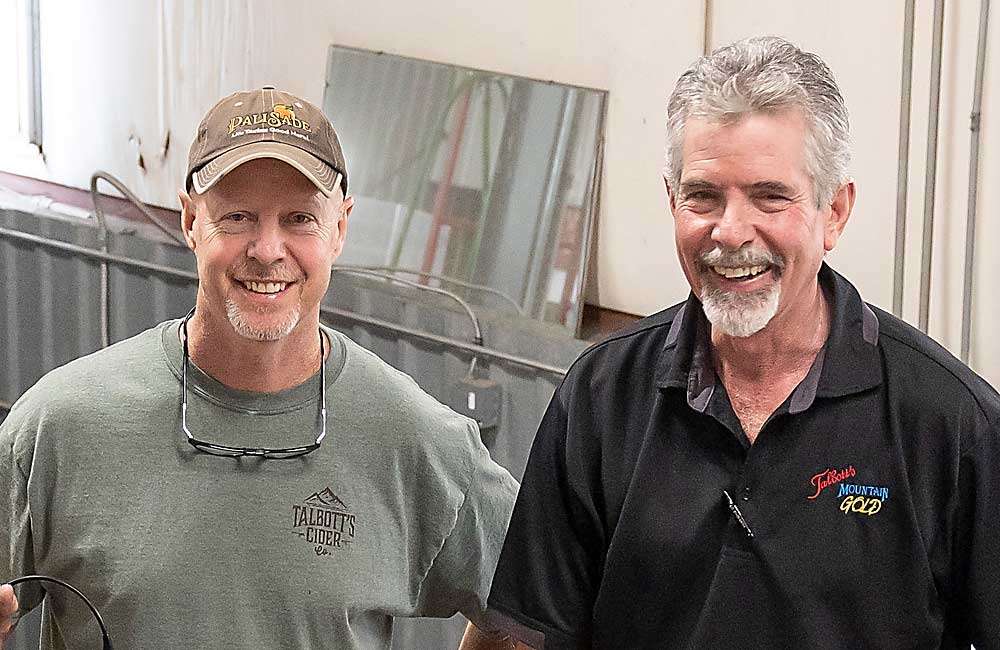 Talbott brothers Nathan, left, and Charlie of Talbott Farms. Nathan runs the packing house and Charlie is the company president. (Kate Prengaman/Good Fruit Grower)