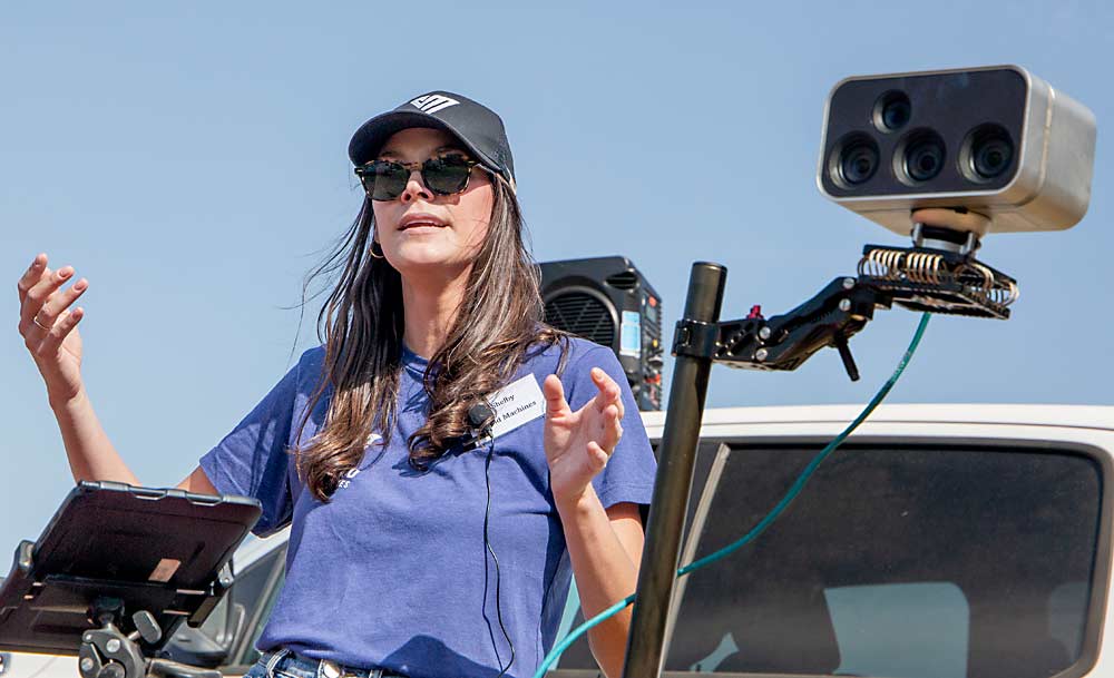 Shelby Greer of Vivid Machines talks about her company’s sensor technology during the Crop Load Management Technology Field Day in July at the Washington State University Sunrise Research Orchard near Wenatchee. (Ross Courtney/Good Fruit Grower)