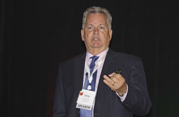 Tony Freytag, vice president of sales and marketing for Crunch Pak, speaks during the U.S. Apple Association Apple Crop Outlook and Marketing Conference in Chicago, Illinois on Aug. 23, 2013. (Richard Lehnert/Good Fruit Grower)