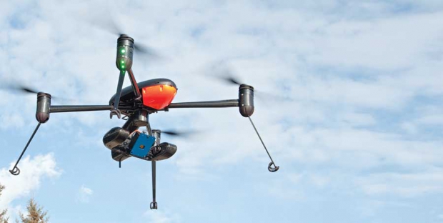 This particular drone uses a specialized camera developed for agricultural use, such as crop health management and soil nutrient testing. (Courtesy Draganfly Innovations Inc.)
