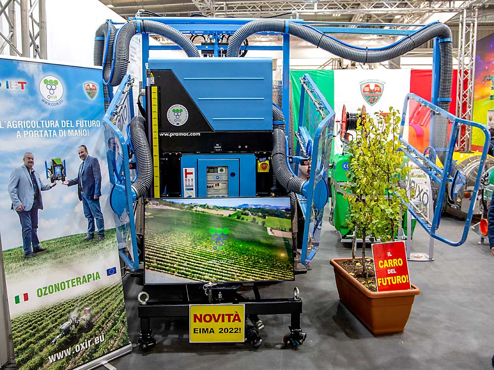 Italian company MET displays its ozone sprayer at the EIMA agricultural equipment trade show in November in Bologna, Italy. The OXIR sprayer has data showing it works and counts several commercial vineyards among its clients, giving previously skeptical U.S. researchers some hope for the technology. (Ross Courtney/Good Fruit Grower)