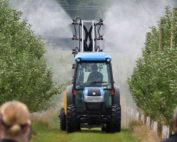 A Hol Spraying System CF airblast sprayer is demonstrated at one of Hedges Apples newer apple blocks in Norfolk County during the 2019 International Fruit Tree Association summer tour in Ontario, Canada, on Monday, July 22. (TJ Mullinax/Good Fruit Grower)