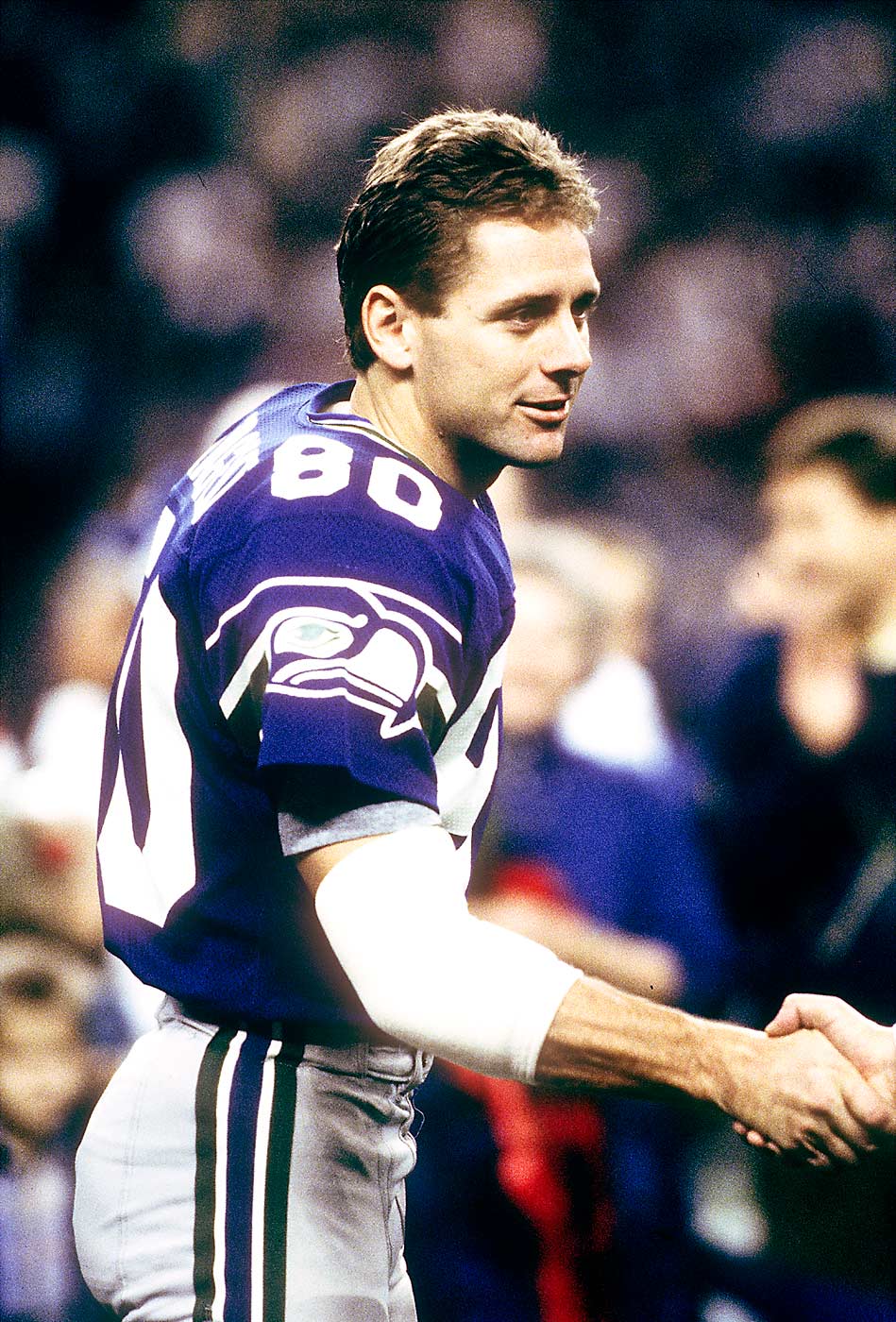 Seattle Seahawks Hall of Fame wide receiver Steve Largent (80), during a celebration after his final game in Seattle, Wash., on December 23, 1989, in The Kingdome. (Courtesy Seattle Seahawks)