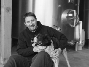 Eric Dunham with his dog Port. (Courtesy of Dunham Cellars)