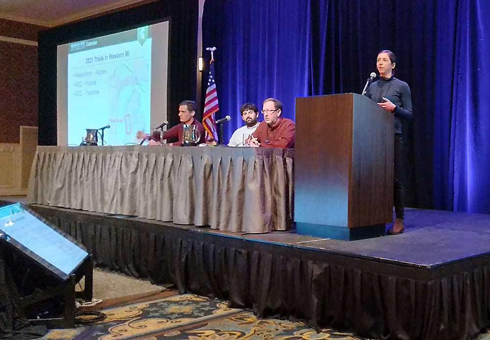 Michigan State University Extension specialist Anna Wallis discusses chemical thinners at the International Fruit Tree Association’s annual conference in Pennsylvania on Feb. 15. (Matt Milkovich/Good Fruit Grower)