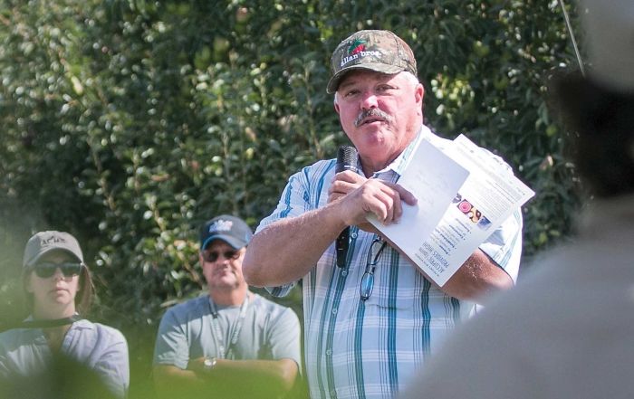 Jim Doornink speaks during the second day of the IFTA Washington tour on July 16, 2015. (TJ Mullinax/Good Fruit Grower)