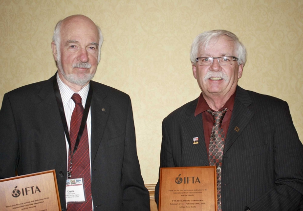 Charles Embree (left) is outstanding researcher of the year. Bill Craig wins Outstanding Extension Worker. (Richard Lehnert/Good Fruit Grower)