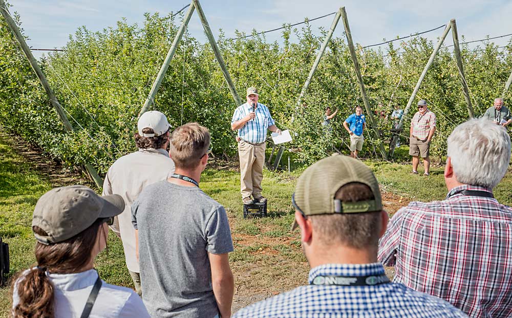 Jim Doornink of Wapato, Washington, hosts a tour in 2015 for the International Fruit Tree Association. Doornink and other industry veterans believe the cherry industry will rise to meet its current challenges. (TJ Mullinax/Good Fruit Grower)