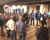 Northwest cherry growers huddle by district to discuss their projected crop estimate Wednesday, May 17, 2017, at the annual 5-state cherry meeting in Richland, Washington. They are calling for a 22.7 million box crop.(Ross Courtney/Good Fruit Grower)