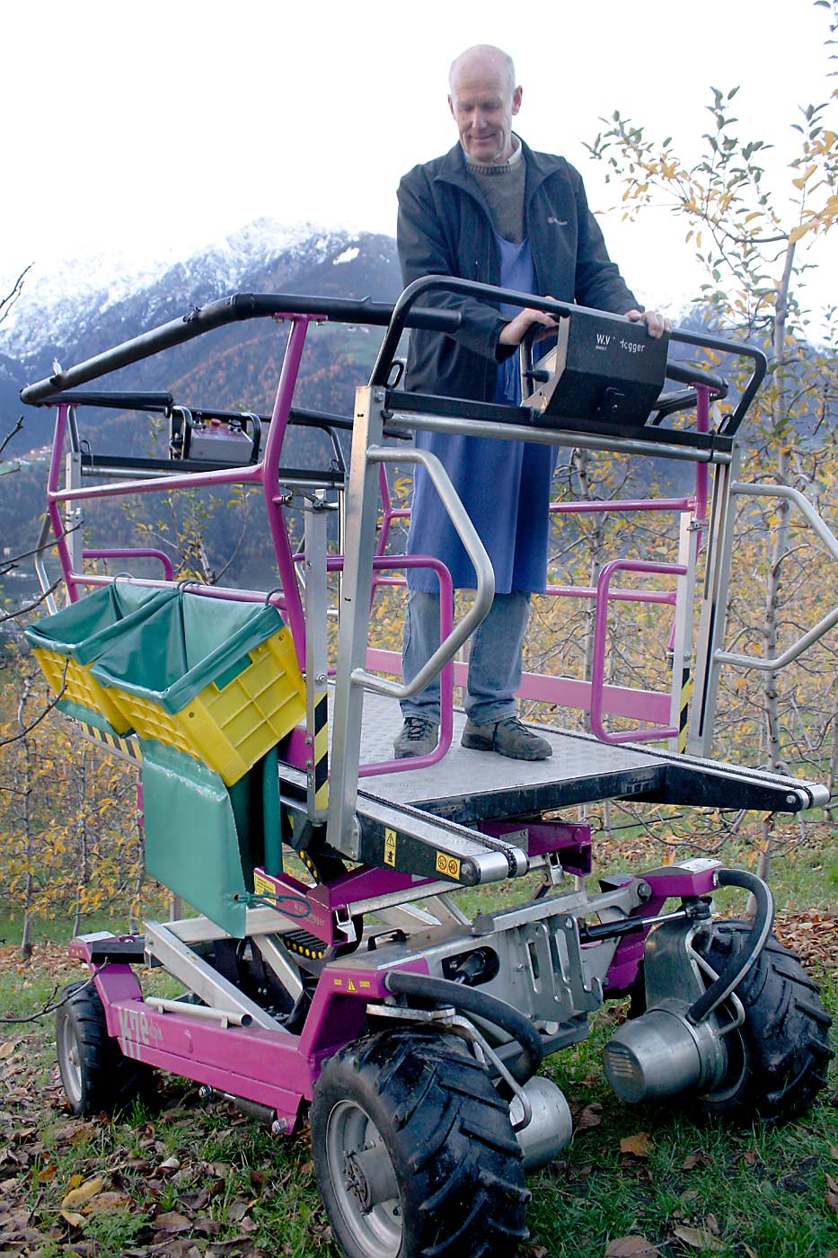 Platforms are especially popular with Italian growers, with newer machines powered by electrical propulsion. This four-wheel, battery-powered platform, designed by Windegger, is one example used in steep South Tyrol orchards. (Richard Lehnert/Good Fruit Grower)