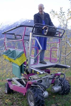 Stefan Klotzner’s farm is very steep, but he has mechanized production processes, including harvesting, using this Windigger K7e Alpin platform, which can climb up or down a 30-degree slope, is hydraulically leveled, and has crab steering forward, backward, and 90 degrees sideways. (Richard Lehnert/Good Fruit Grower)