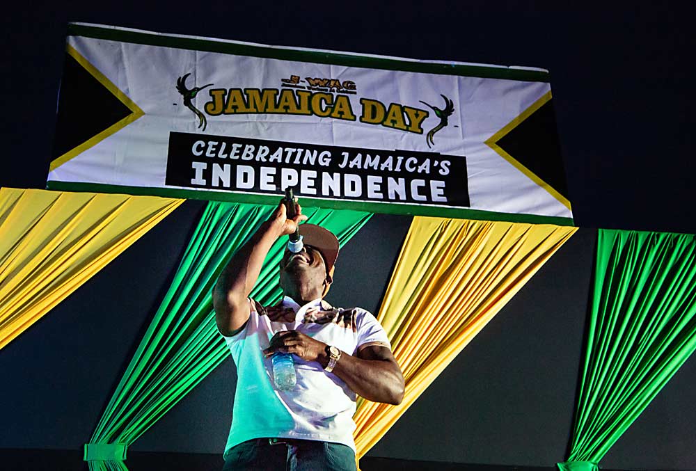 Oniel Johnson belts out a song in August at a festival held every year by the Jamaican H-2A workers of Gebbers Farms in Brewster, Washington, to commemorate their nation’s independence. (Ross Courtney/Good Fruit Grower)