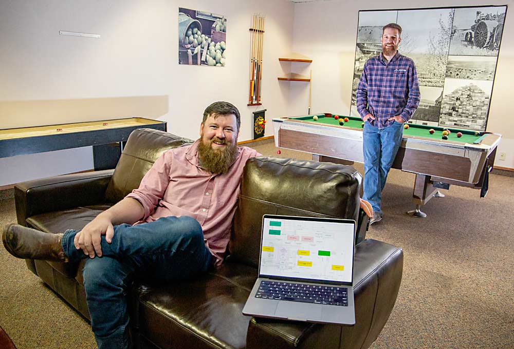 Matt Yeager, left, and Justin Pease, founders of Kragworks Ag Solutions, are designing a large language model chatbot not only specific to the tree fruit industry but specific to each grower. (Ross Courtney/Good Fruit Grower)