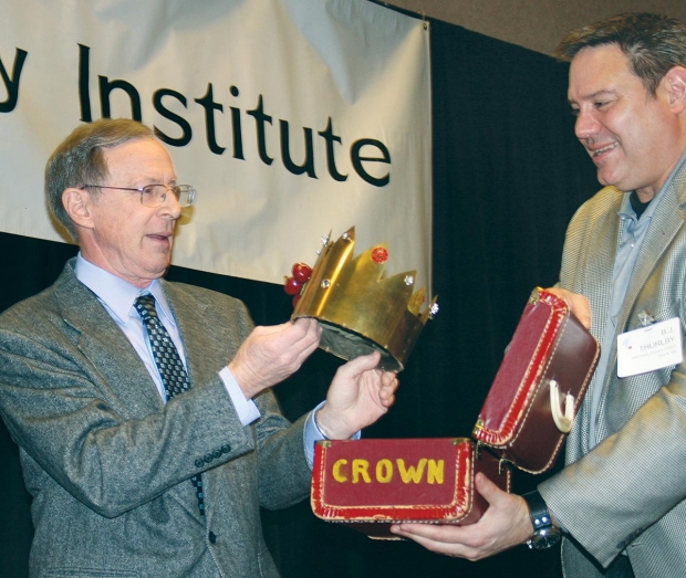 Tim Smith, 2012 Cherry King, (left) and B.J. Thurlby, president of Northwest Cherry Growers, prepare to crown the 2013 Cherry King. Who was it?