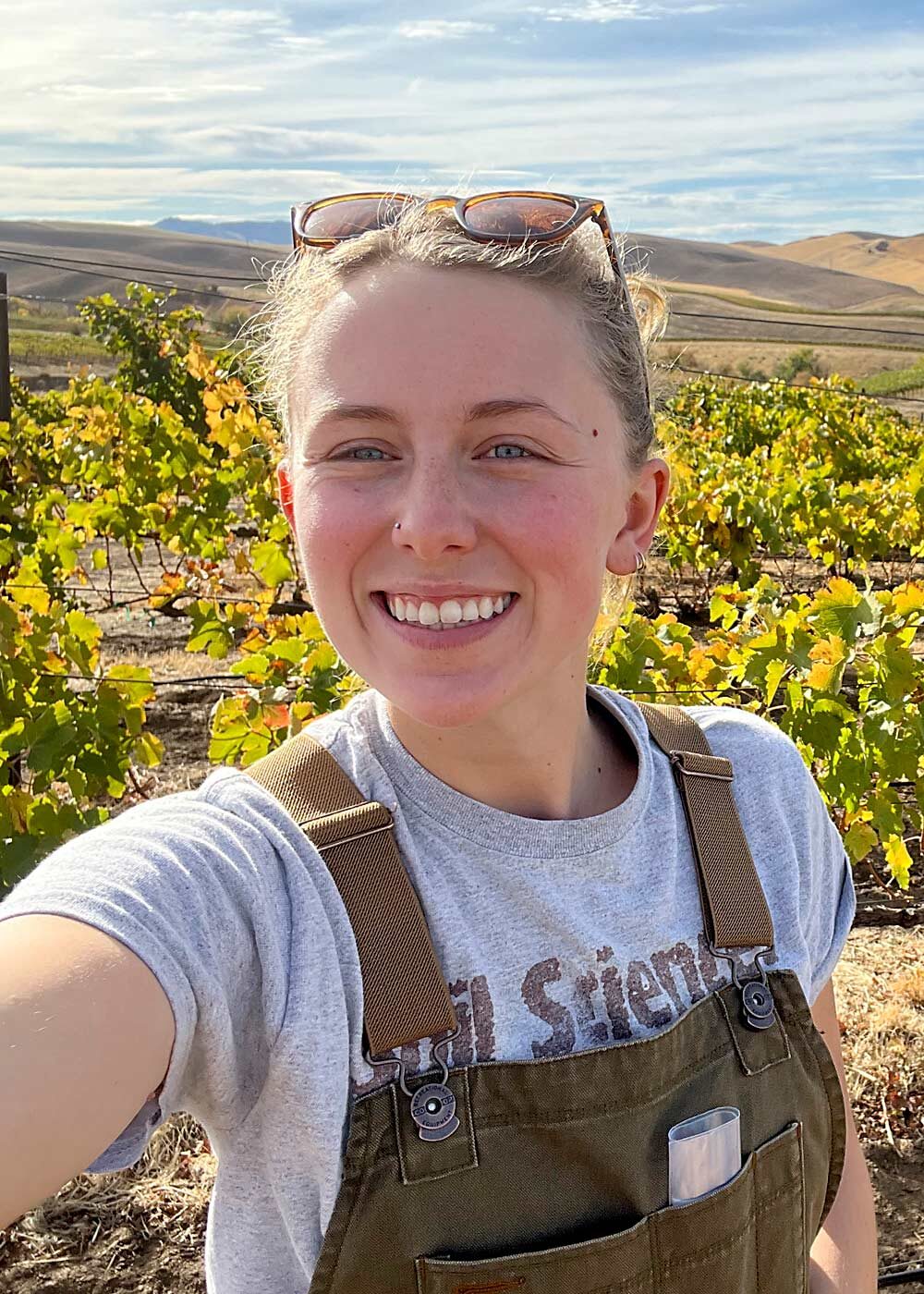 Molly McIlquham snaps a selfie during her vineyard research in 2021. (Courtesy Molly McIlquham/Washington State University)
