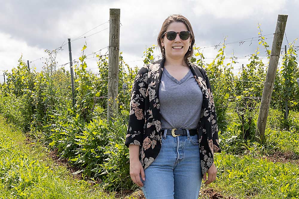 Rachel Lightfoot of Lightfoot & Wolfville Vineyards in Wolfville, Nova Scotia. Her vineyard relies on breezes from the Bay of Fundy to help dry out vine canopies, but the breezes haven’t been as consistent lately. (Matt Milkovich/Good Fruit Grower)