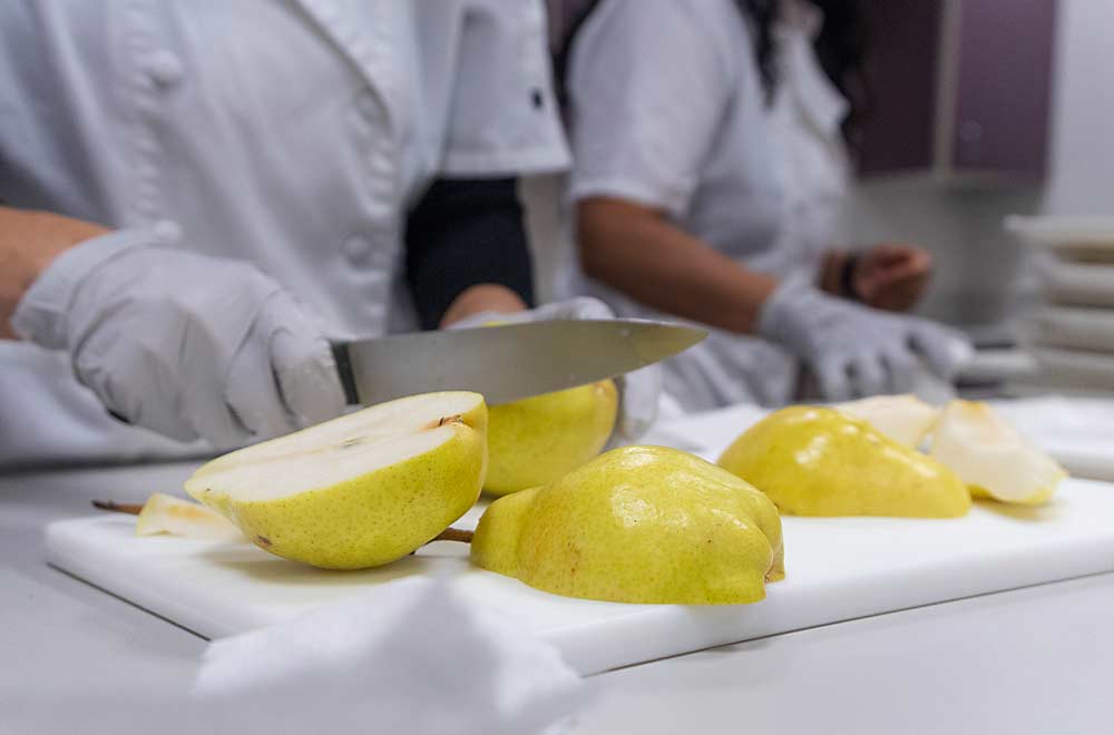 Pear samples are prepared for testing. (Cole Quinn/for Good Fruit Grower)