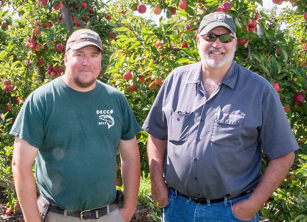 Jake Rasch, left, and Don Rasch at Rasch Family Orchards in September. (Matt Milkovich/Good Fruit Grower)