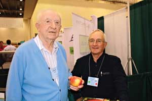 Wayne Watts, left, found Scarlet Star in his Northern Spy orchard six years ago. Richard Lehnert/Good Fruit Grower