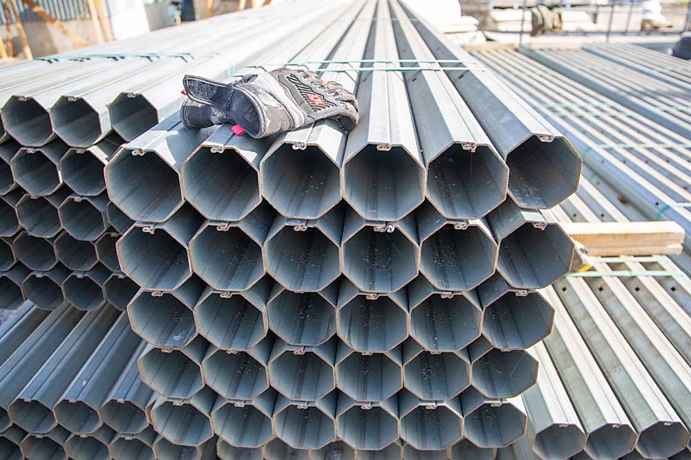 Four-inch steel posts await installation in October 2021 at a new cherry orchard in Benton City, Washington. (Ross Courtney/Good Fruit Grower)