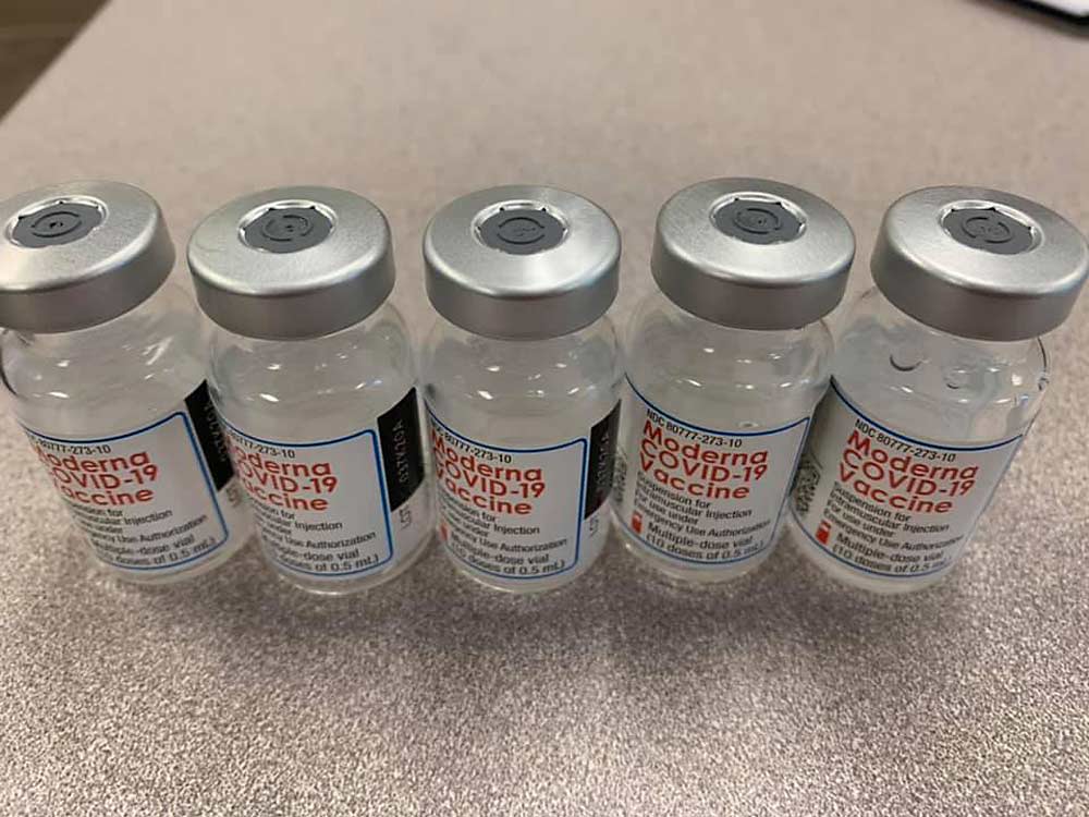 Vials of the Moderna COVID-19 vaccine are lined up on a table earlier in January at a community vaccination event in Prosser, Washington. (Courtesy Merry Fuller/Prosser Memorial Health)