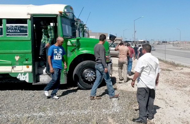 H-2A workers arrive at the U.S. Consulate in Tijuana, Mexico, for interviews on May 13, 2014. Each worker undergoes a background check and a personal appointment says Washington Farm Labor Association staff. (Courtesy Heri Chapula/Washington Farm Labor Association)