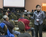 Melba Salazar-Gutierrez of Washington State University speaks about practical use of AgWeatherNet in orchards during one of the Spanish speaking sessions at the annual meeting of the Washington State Tree Fruit Association. (TJ Mullinax/Good Fruit Grower)