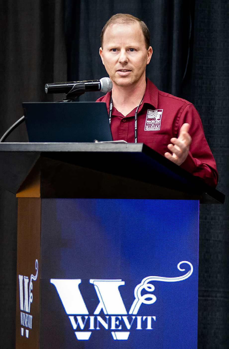 Trent Ball, a Yakima Valley College professor, discusses the wine industry’s updated cost-of-production calculator in February at the WineVit conference in Kennewick, Washington.(Ross Courtney/Good Fruit Grower)