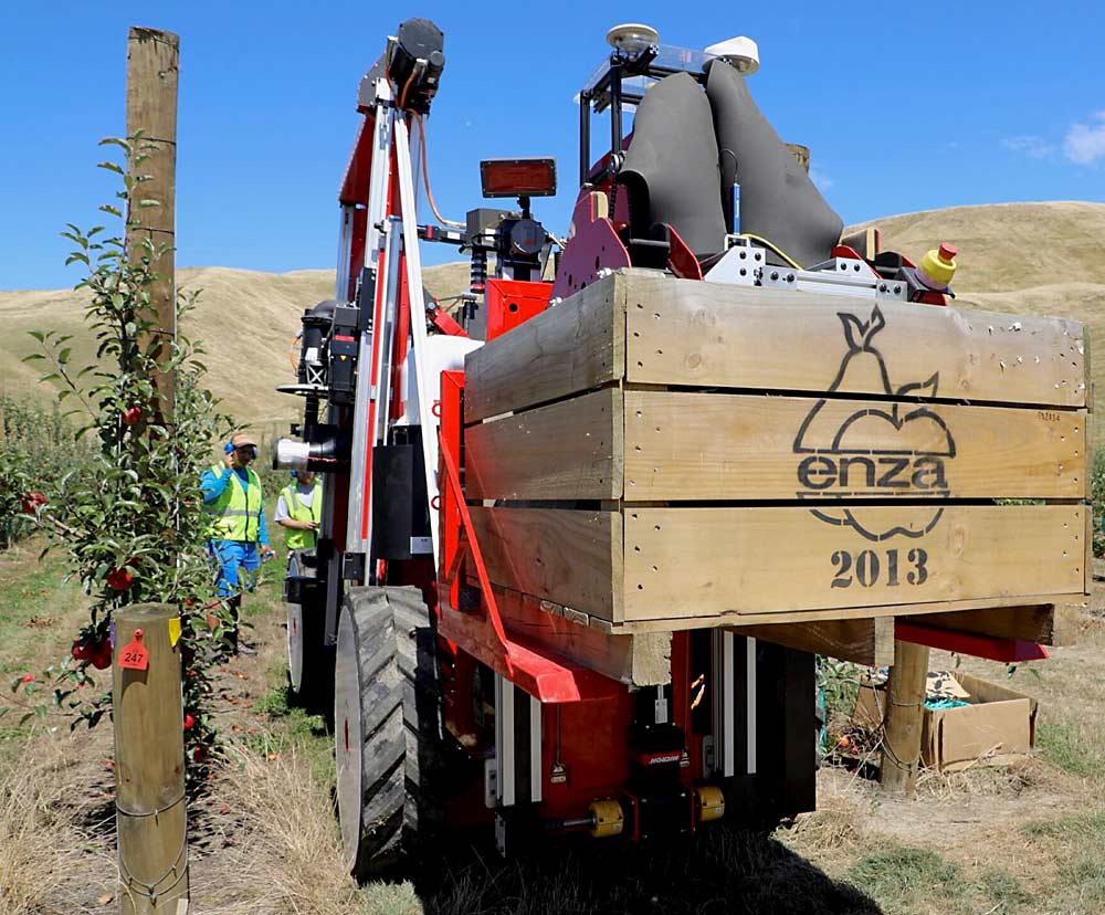 The bin delivery system on the rear of the latest Abundant Robotics Apple Harvester at a T&G Global orchard in New Zealand in February 2019. (Courtesy Abundant Robotics)