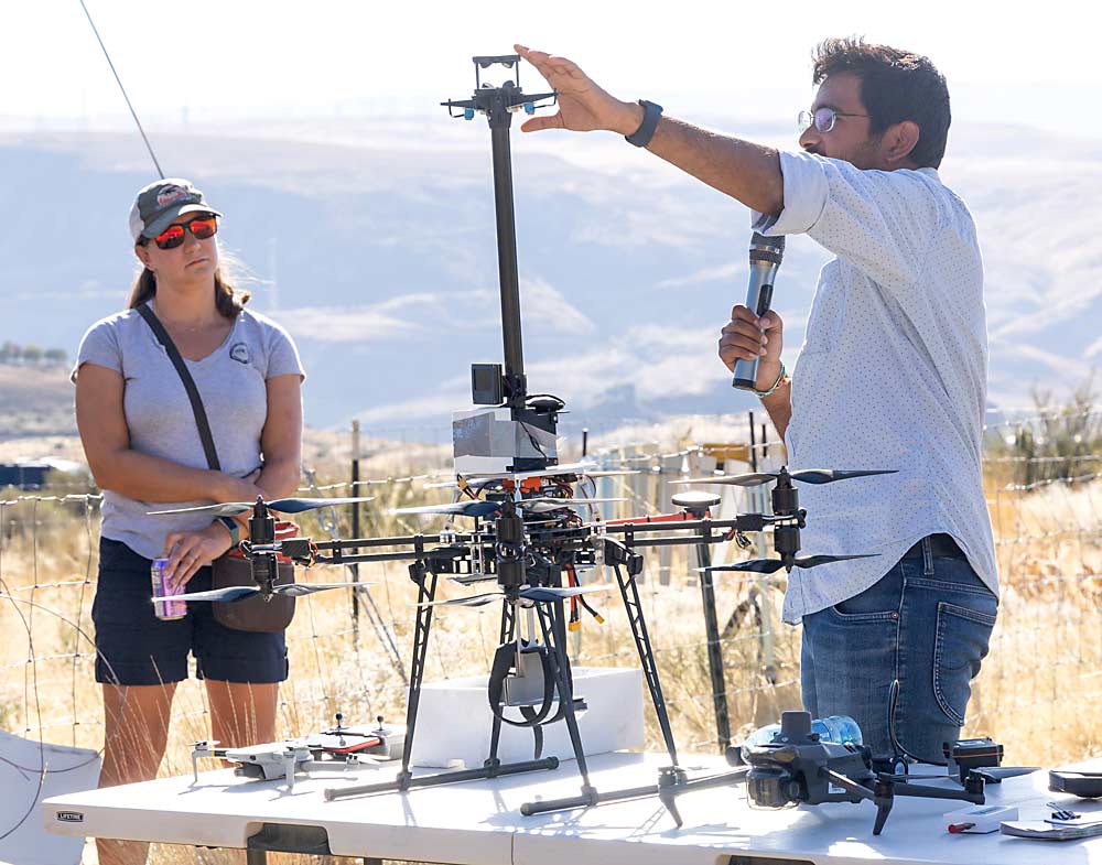 Gorthi explains how the thermal sensors on this drone were used to assess the performance of wind machines, spatially, during frost events. (Kate Prengaman/Good Fruit Grower)