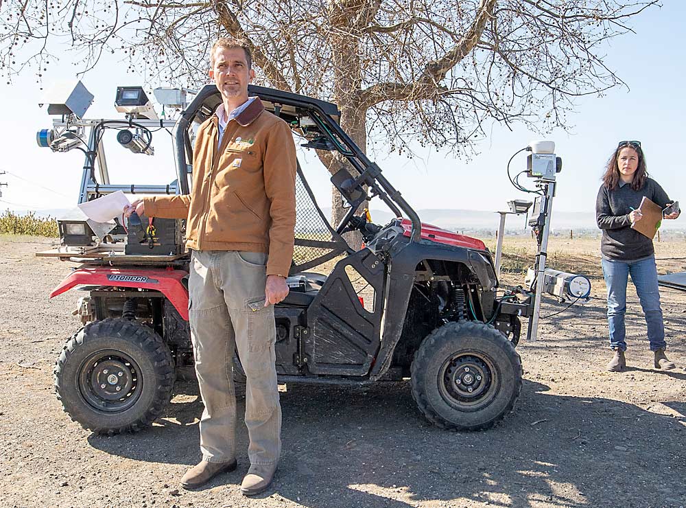 Mantle introduces an ATV that exemplifies the Smart Orchard approach: Throw a lot of different sensors and other smart technology at an orchard and see what delivers value. In this case, one pass with this ATV can: collect data on the canopy volume with a lidar sensor mounted above the front; create a map of soil nutrient composition with a scanning sensor, also mounted on the front; and count bloom or fruit density with a camera system at the back. (TJ Mullinax/Good Fruit Grower)