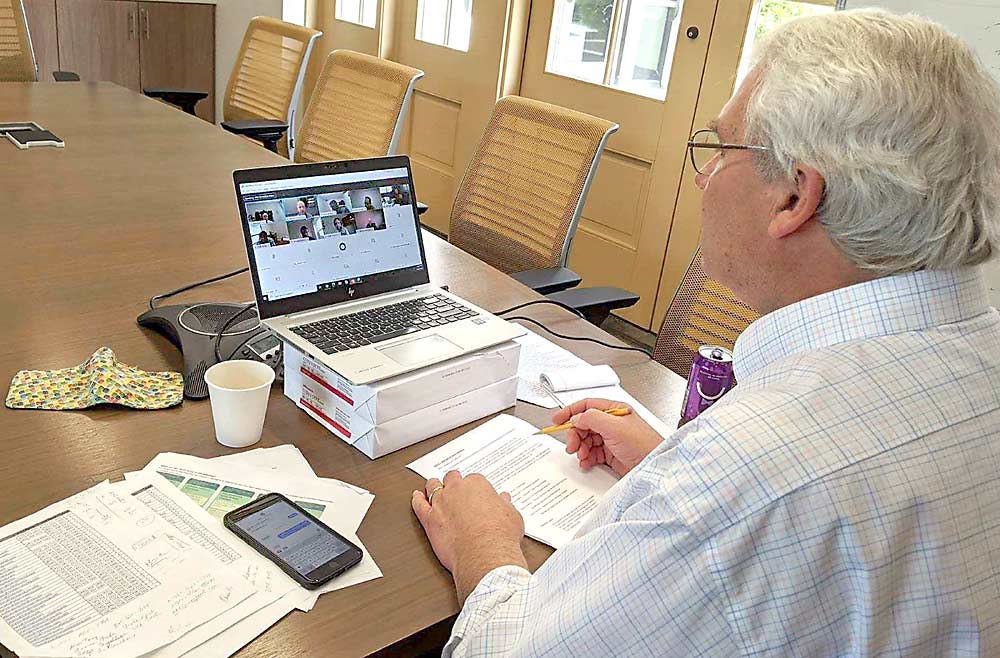 Dennis Donohue, director of Western Growers Center for Innovation and Technology, meets with other members of the harvest automation initiative working group via virtual meeting in 2020. The labor challenges facing specialty crop producers are too great to let the pandemic slow efforts to launch the new automation acceleration initiative, he said. (Courtesy Western Growers)