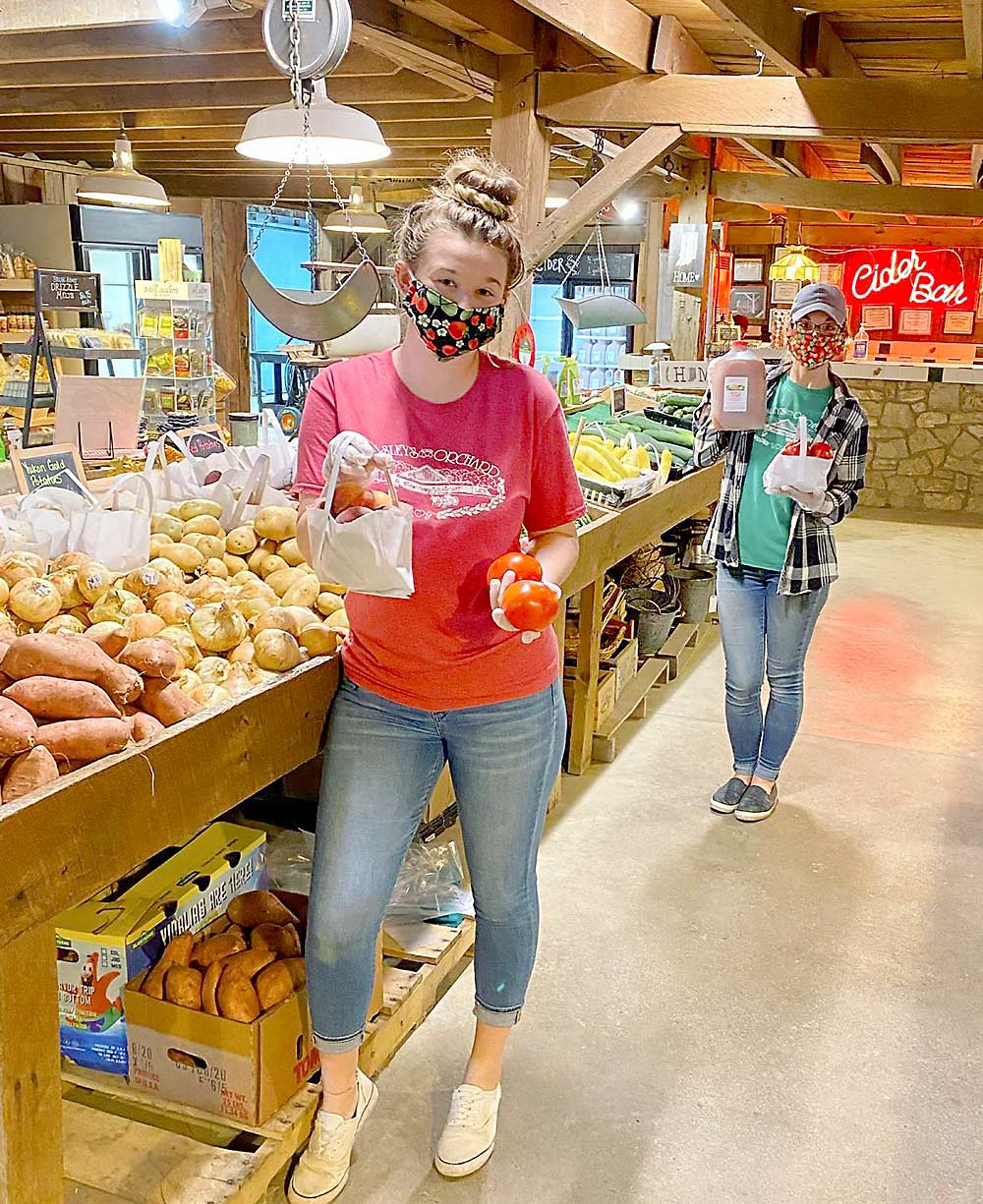 Employees at Beasley’s Orchard, a farm market near Indianapolis, Indiana, wore masks last fall, just one of the many changes forced on farm markets during the coronavirus pandemic. (Courtesy Calvin Beasley/Beasley’s Orchard)