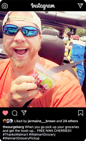 Jeff Berg posts a selfie holding a sample pack of Northwest cherries, given away to curbside-pickup customers, in late June at a Bentonville, Arkansas, Walmart. The socially distant sample is one of many ways marketers devised to promote cherries during the coronavirus pandemic. Berg is a motivational speaker and corporate trainer who sometimes contracts with Walmart. (Courtesy Northwest Cherry Growers)