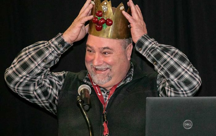 Pat Sullivan dons the crown as the 78th Cherry King at the luncheon Friday of the annual Cherry Institute, hosted by the Northwest Cherry Growers, in Yakima, Washington. (TJ Mullinax/Good Fruit Grower)