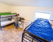 Providing ample space, as shown in this 2015 photo, in housing units for agricultural workers is one of several challenges farms face when reducing the risk of potentially spreading the coronavirus. Recommendations include arranging beds 6 feet apart, setting aside quarantine areas for sick workers and disinfecting surfaces daily. (TJ Mullinax/Good Fruit Grower)