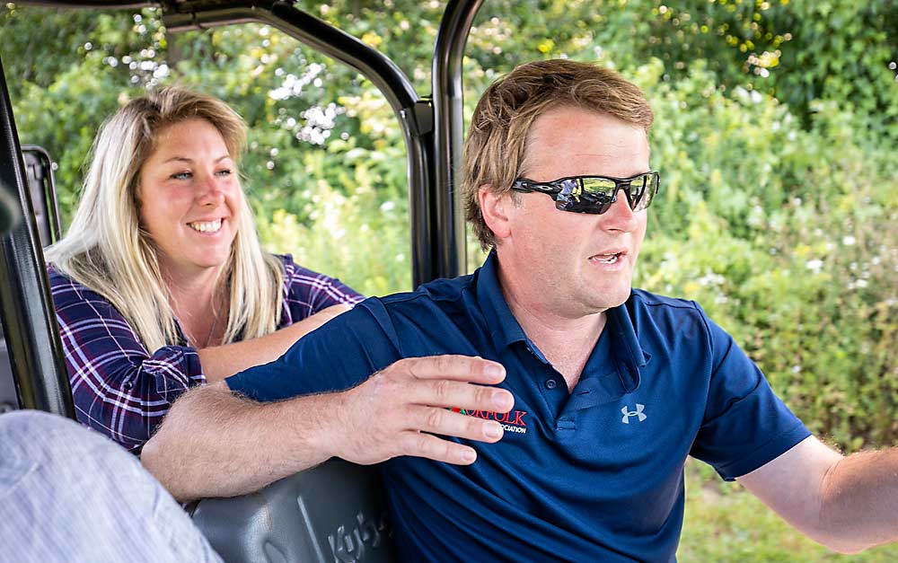 Hayden (right) and Amanda Dooney have ambitious plans for the apple farm they bought in Simcoe, Ontario, Canada, in 2019. In their second year farming together, they bought a second orchard, growing their business despite pandemic uncertainty. (TJ Mullinax/Good Fruit Grower)