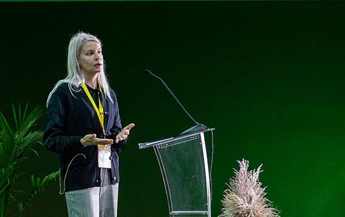 Jennifer Marston, global ag tech editor for AgFunder, delivers the keynote speech at the FIRA USA automation conference in September in Salinas, California. (TJ Mullinax/Good Fruit Grower)