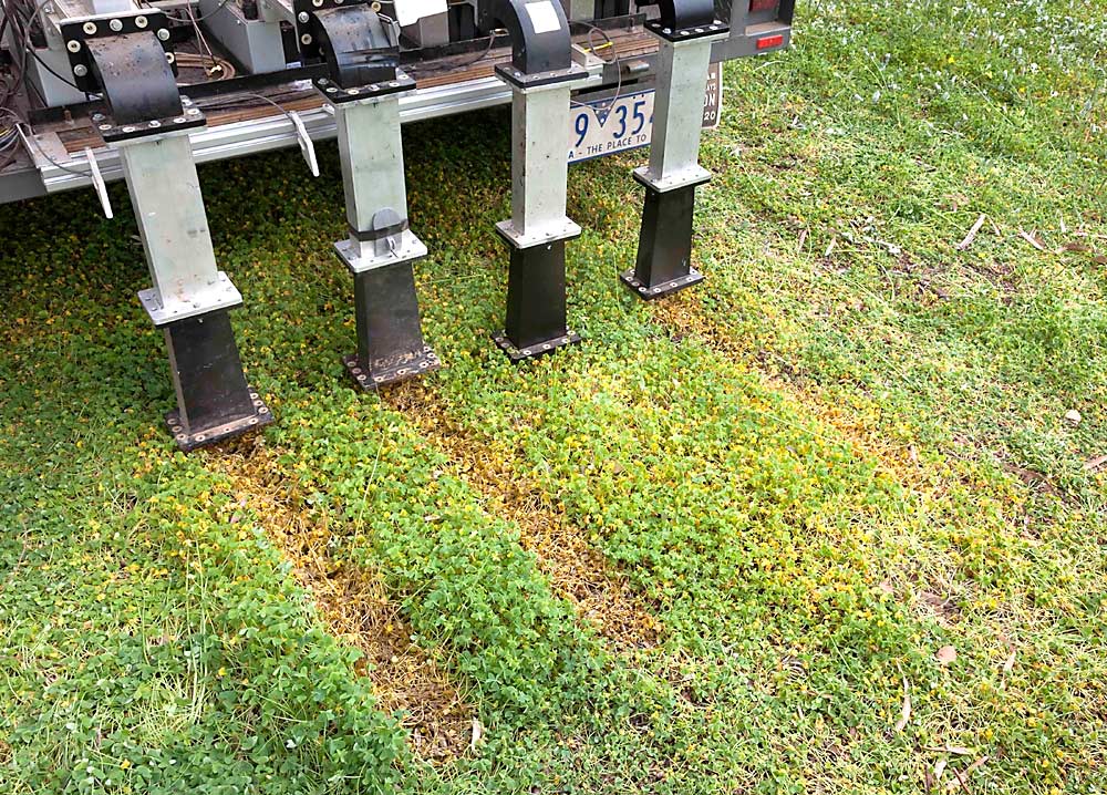 University of Melbourne engineering professor Graham Brodie’s machine uses four horned antennas to direct electromagnetic waves onto unwanted vegetation, essentially cooking it until its cellular structure breaks. He says it kills weeds under grapevines, without harming the vines. (Courtesy Ian Crick/University of Melbourne)