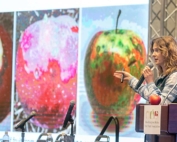 Ines Hanrahan, executive director of the Washington Tree Fruit Research Commission, speaks about disorders in Cosmic Crisp at the Washington State Tree Fruit Association’s annual meeting in December 2018. (TJ Mullinax/Good Fruit Grower)