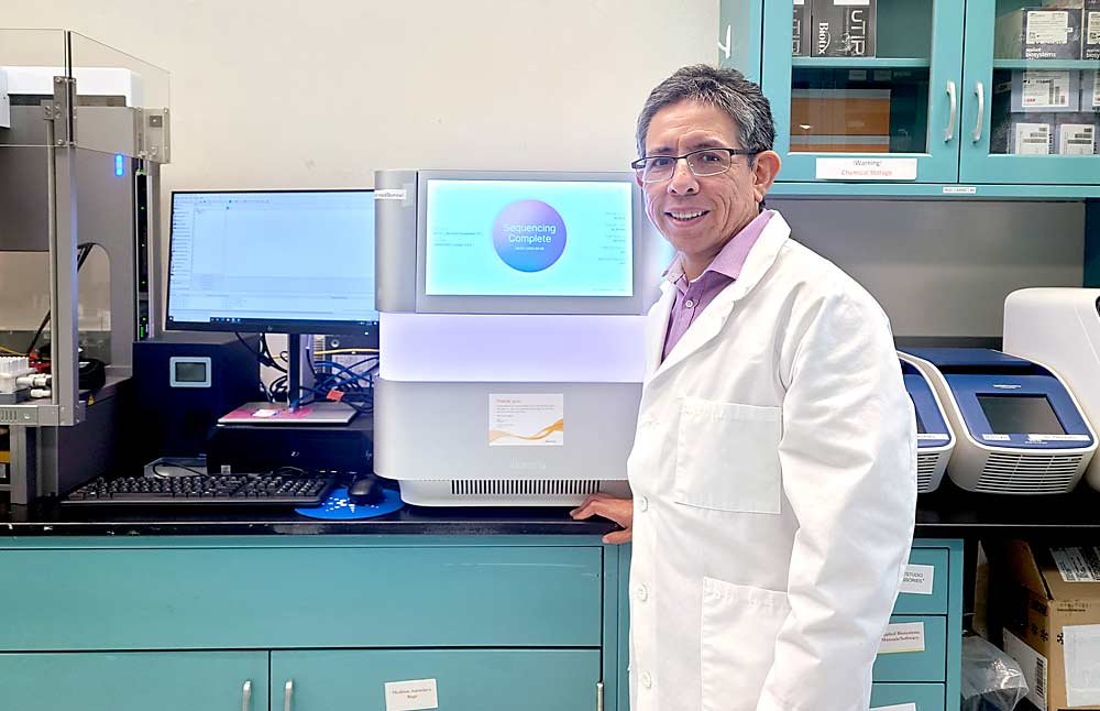 Oscar Hurtado-Gonzales, lead plant pathologist in the U.S. Department of Agriculture’s Animal and Plant Health Inspection Service, and his team helped develop a new technique that is able to detect 34 common tree-fruit viruses and viroids more quickly than the current method used to test imported planting stock. (Courtesy USDA Animal and Plant Health Inspection Service)