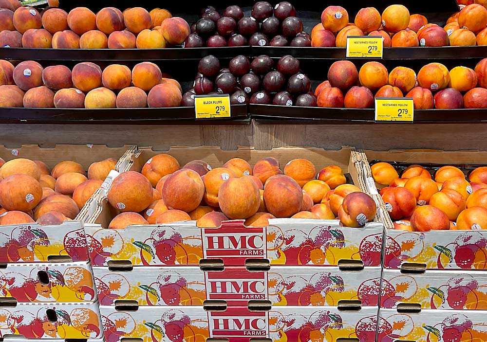 Peaches, plums and nectarines from HMC Farms of Kingsburg, California, for sale in a Washington grocery store Sept. 2. The company voluntarily recalled all three of these products marked with stickers 4044 yellow peaches, 4378 yellow nectarines and 4040 black on Nov. 17 due to potential listeria contamination. (TJ Mullinax/Good Fruit Grower)