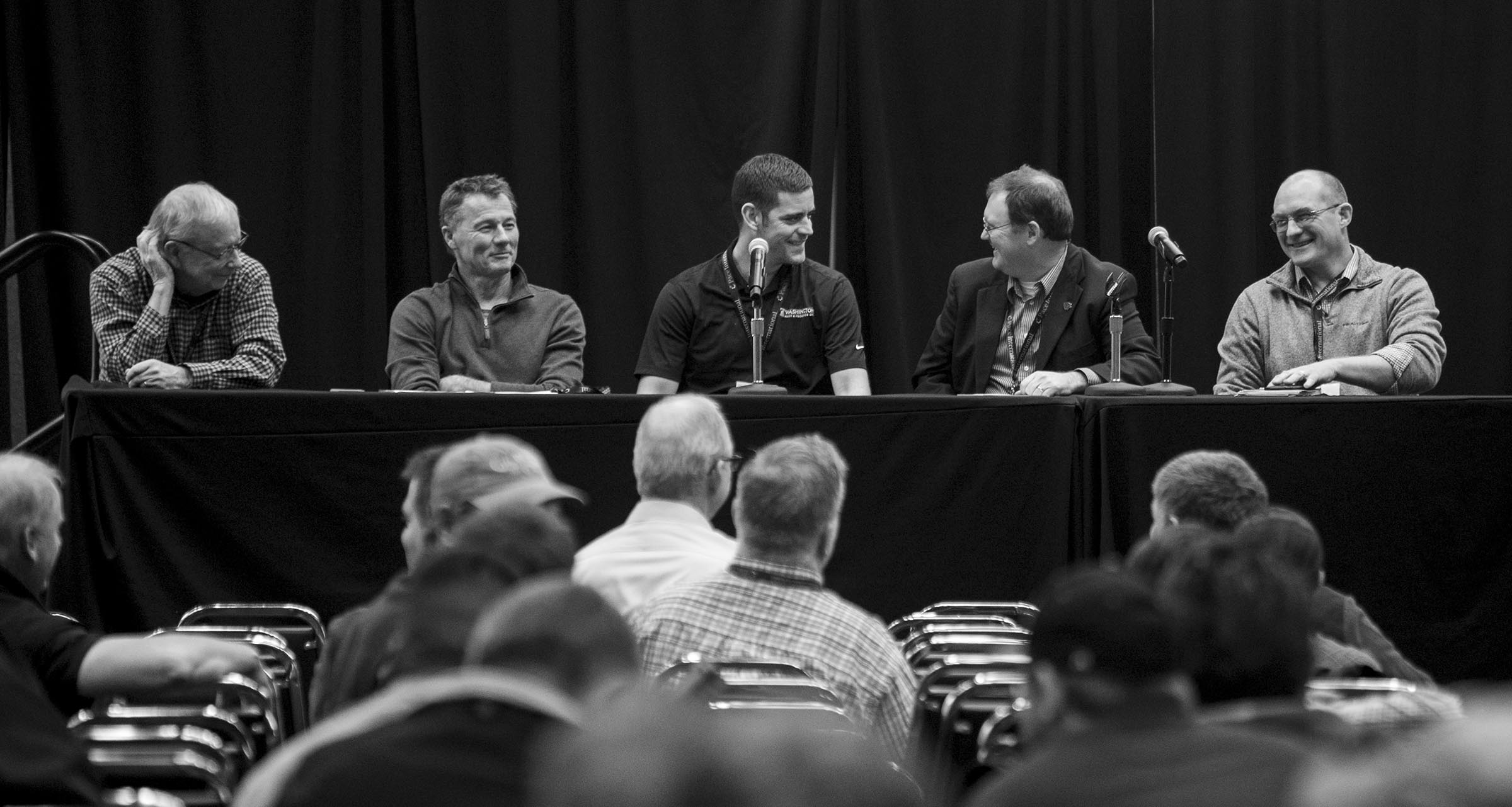 The final day two panel covering harvest management shares a laugh at the conclusion of their talk during the Washington State Tree Fruit Association's annual meeting on Tuesday, December 4, 2018, at the Yakima Convention Center in Yakima, Washington. (TJ Mullinax/Good Fruit Grower)