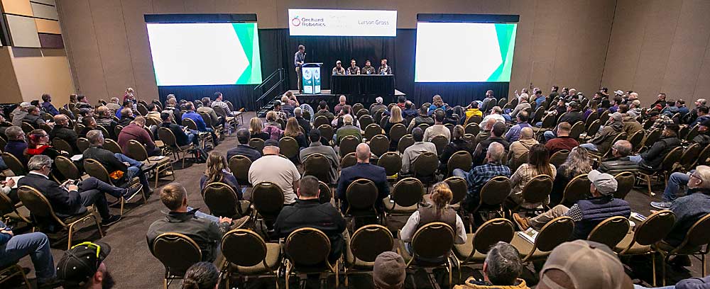 A packed room listens to four growers and a tech startup CEO discuss irrigation technology in December at the Washington State Tree Fruit Association Annual Meeting in Kennewick. (TJ Mullinax/Good Fruit Grower)